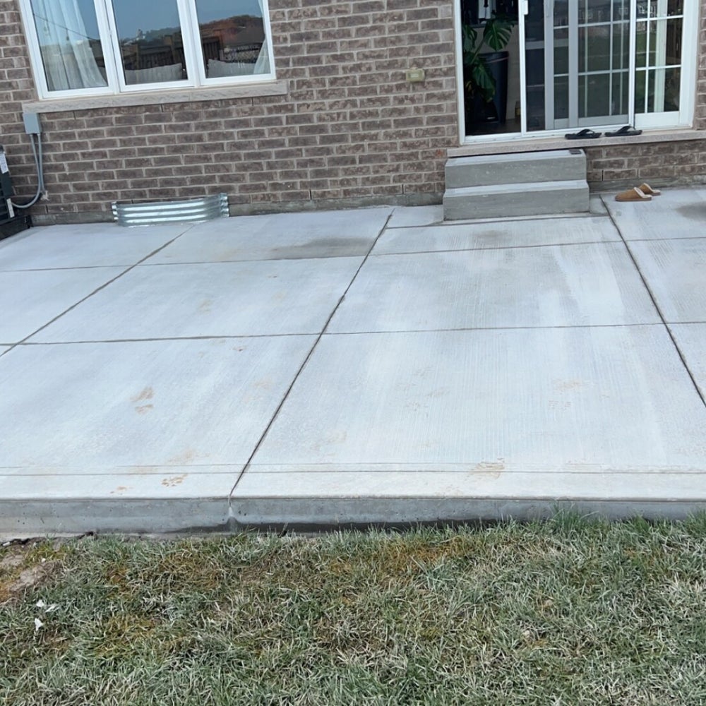 Century Construction crew cutting concrete on site